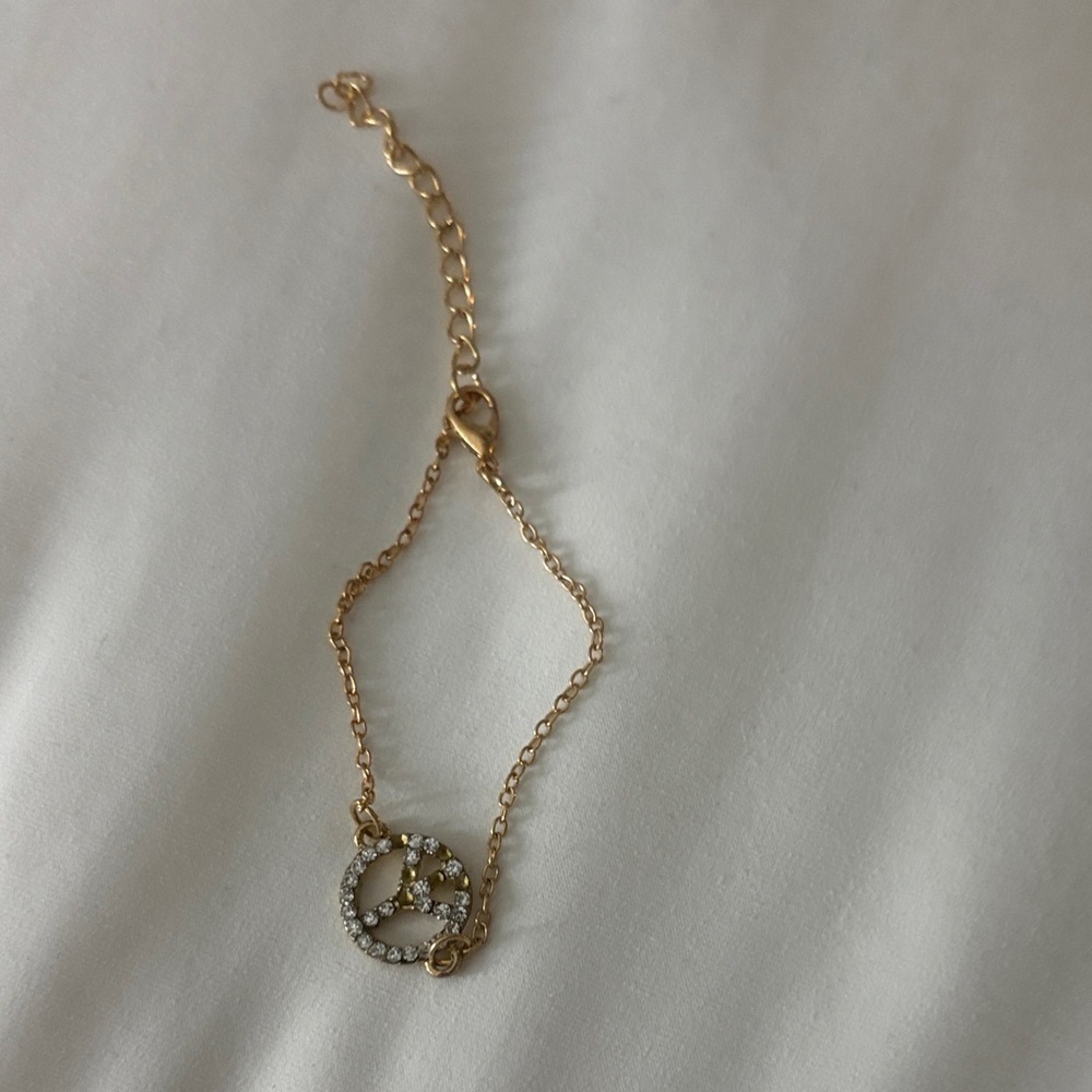 Elegant Gold Peace Sign Bracelet